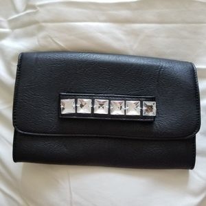 Black studded clutch